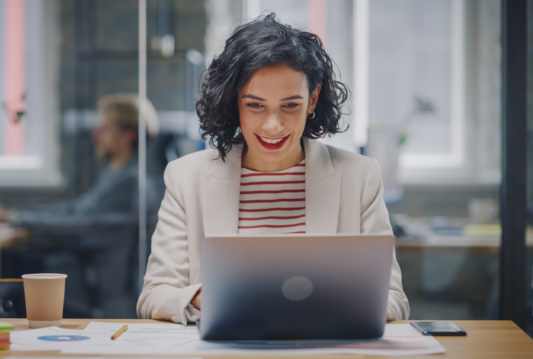 Woman in front of her laptop